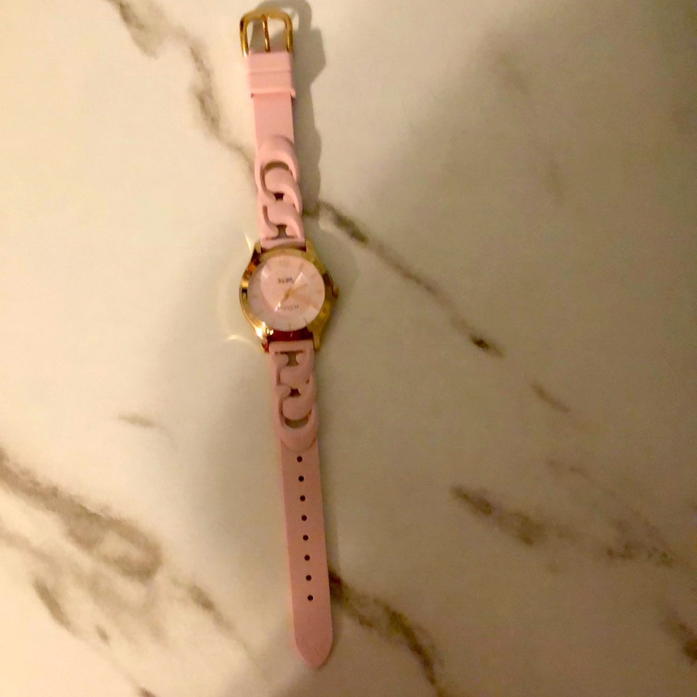 Womens Pink Coach Watch with original Coach silicon band. Needs battery.